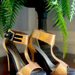 Cute black and gold open toe heels gently used